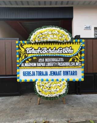 Papan Bunga Duka di Maniamolo